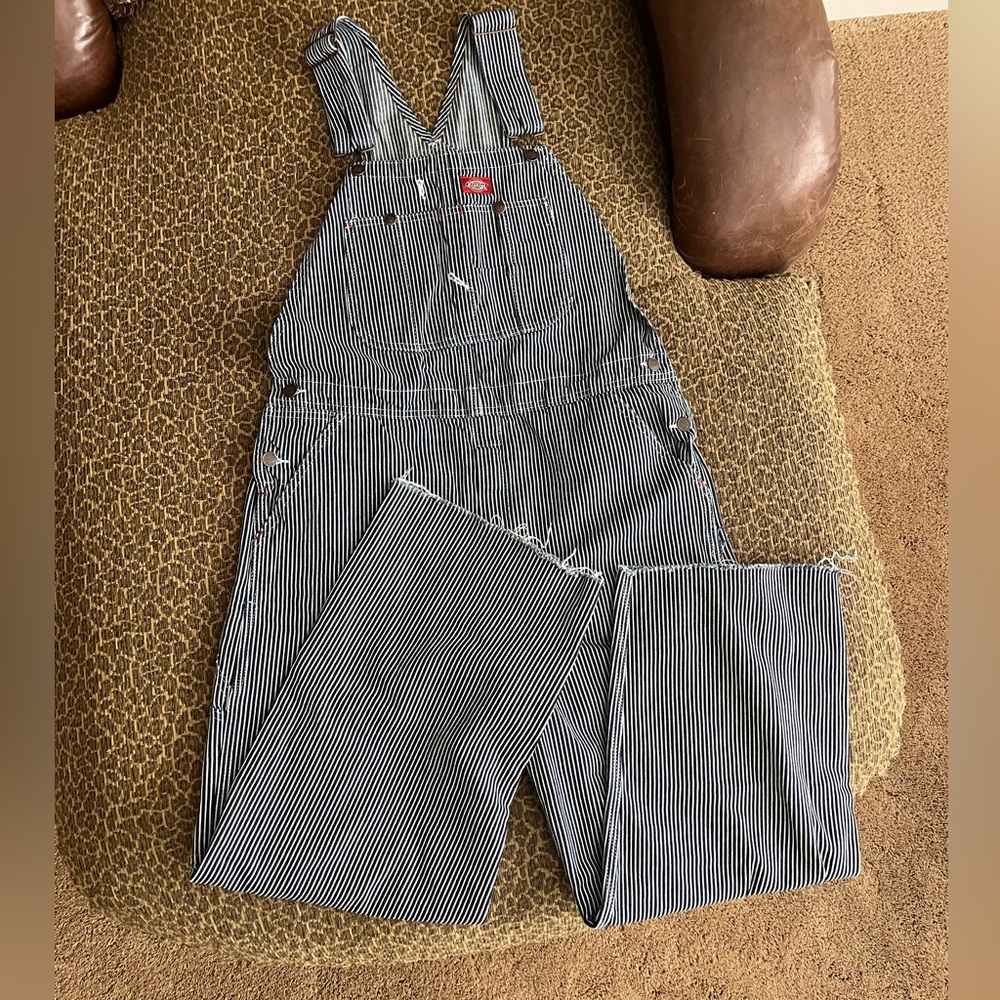 Dickies brand dark blue striped straight leg relaxed overalls with a raw hem